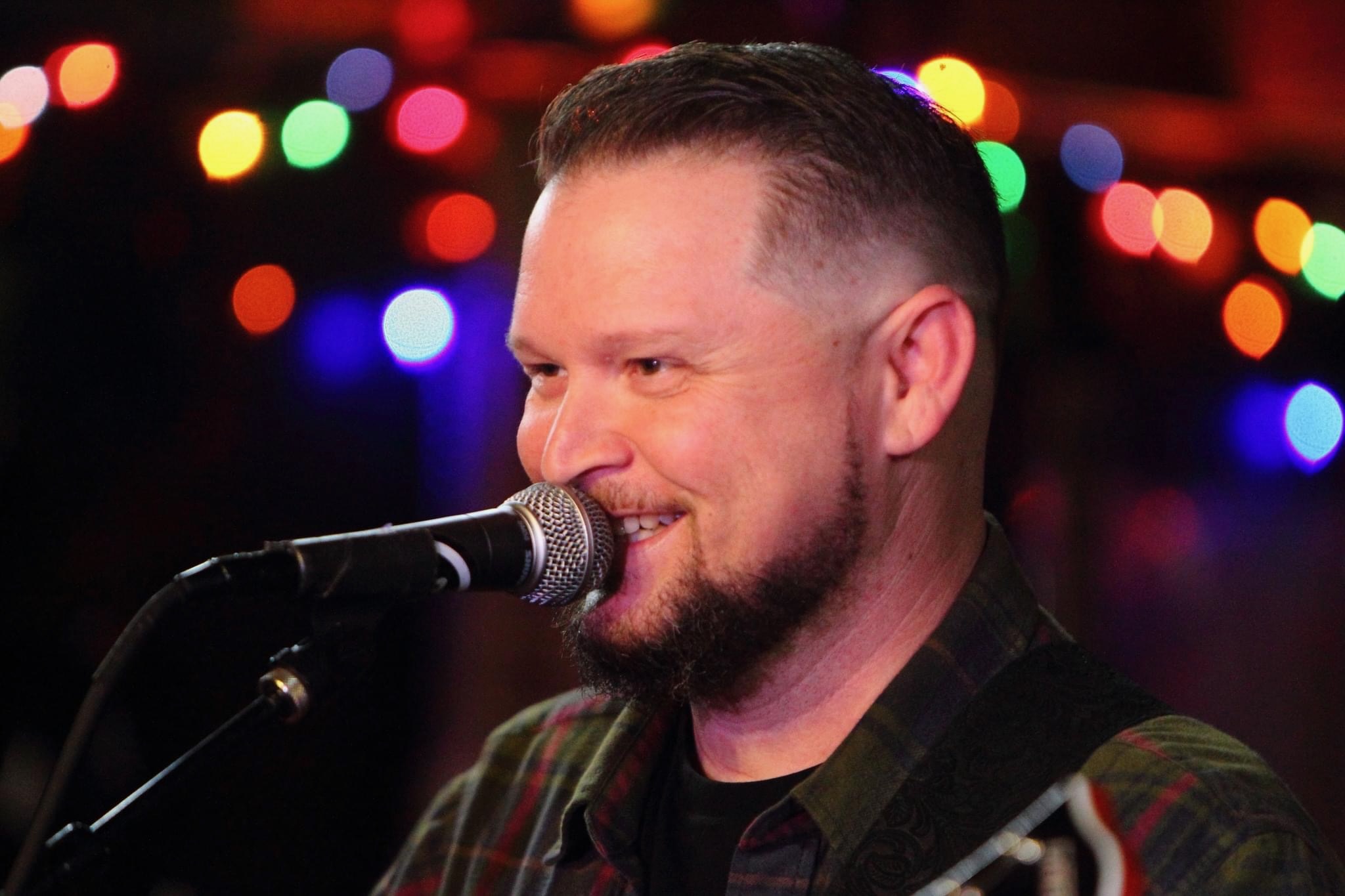 Joe Sims singing live